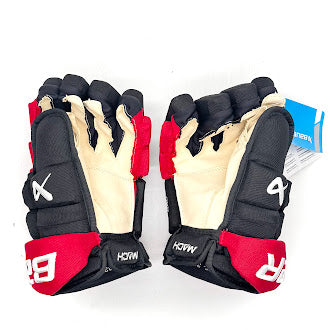 Bauer Supreme Mach - Gants de hockey NHL Pro Stock - Sebastian Aho (noir/rouge)